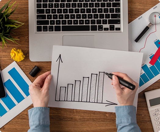 Business professional presenting to team in meeting room