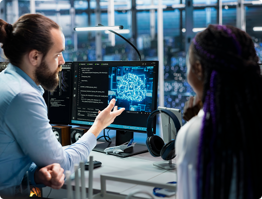 Team discussing numbers and flow in front of a presentation board